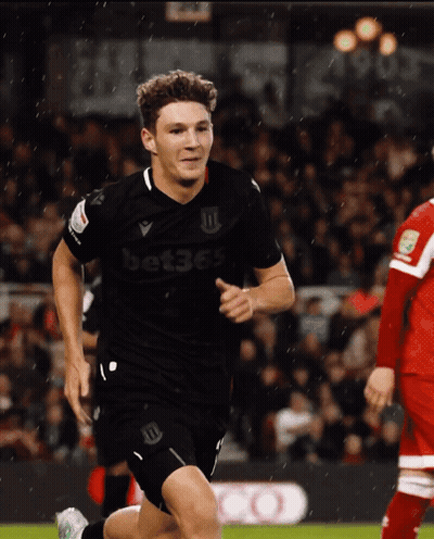 Soccer Player In Black Bet365 Jersey Running GIF