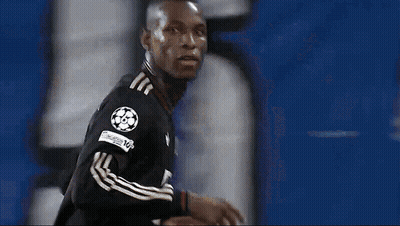Soccer Player In Black Jersey With Number 8 On Sleeve GIF