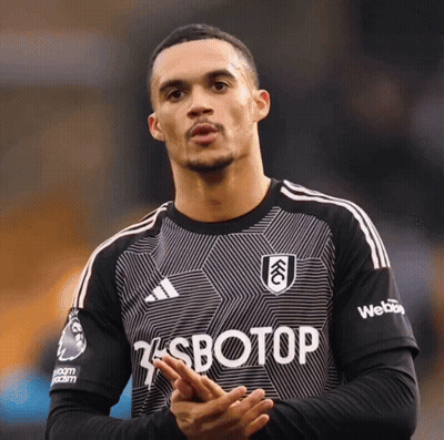 Soccer Player In Black Jersey With Sbotop GIF