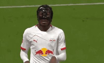 Soccer Player In Black Mask And Red Bull Jersey GIF