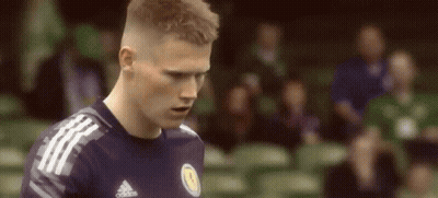 Soccer Player In Blue Adidas Jersey Looking Down GIF