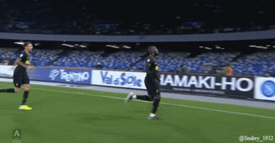 Soccer Player In Blue And Black Jersey Catching Ball GIF