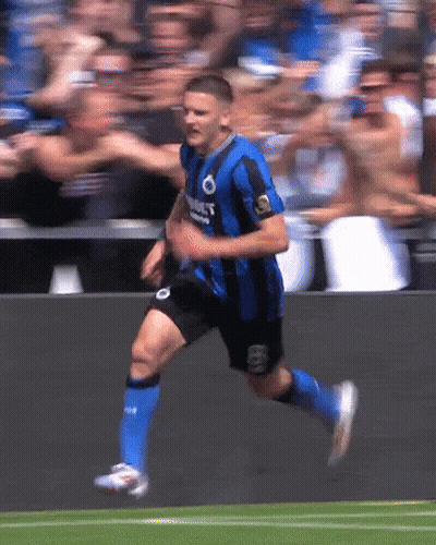 Soccer Player In Blue And Black Jersey Saying Connect GIF