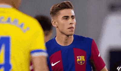 Soccer Player In Blue And Gold Jersey Number 4 GIF