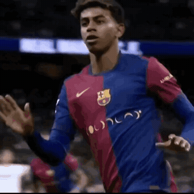 Soccer Player In Blue And Red Nike Jersey Waving GIF