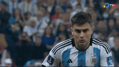 Soccer Player In Blue And White Adidas Jersey Looking At Camera GIF