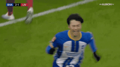 Soccer Player In Blue And White Jersey Celebrating Goal GIF