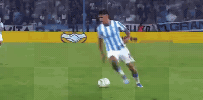 Soccer Player In Blue And White Jersey Kicking Ball GIF
