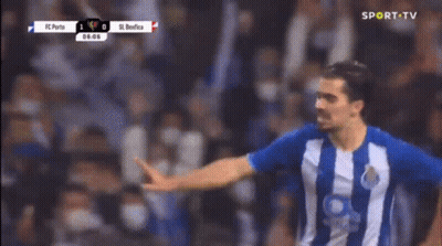 Soccer Player In Blue And White Striped Shirt Celebrating Goal GIF