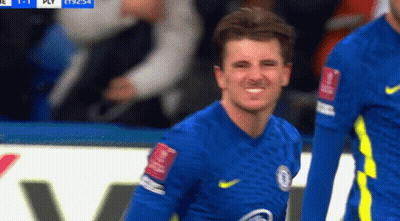 Soccer Player In Blue And Yellow Jersey Smiling GIF