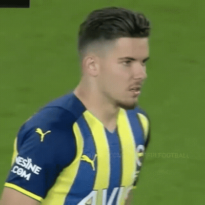 Soccer Player In Blue And Yellow Striped Shirt GIF