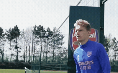 Soccer Player In Blue Emirates Shirt On Field GIF