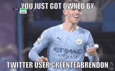 Soccer Player In Blue Etihad Airways Jersey Smiling And Pointing GIF