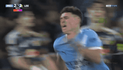 Soccer Player In Blue Jersey Celebrating Goal GIF