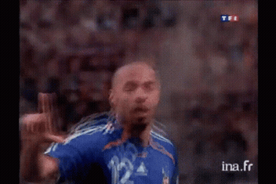 Soccer Player In Blue Jersey Number 12 GIF
