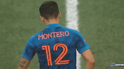 Soccer Player In Blue Jersey Number 12 GIF
