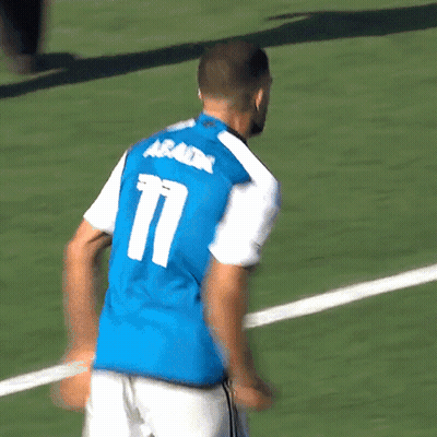 Soccer Player In Blue Jersey Number 12 GIF