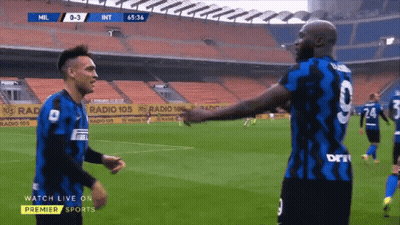 Soccer Player In Blue Jersey Number 9 Celebrating With Fans GIF