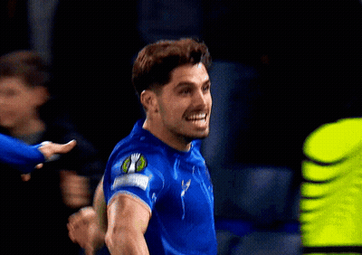 Soccer Player In Blue Jersey With Captain Patch GIF