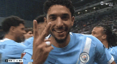 Soccer Player In Blue Jersey With City Logo GIF