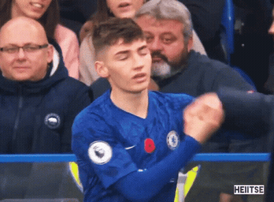 Soccer Player In Blue Jersey With Poppy GIF
