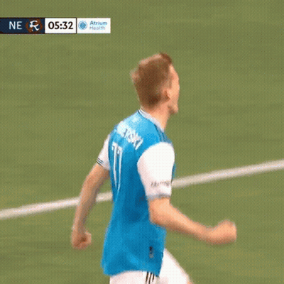 Soccer Player In Blue Jersey With Qatar Tackled GIF