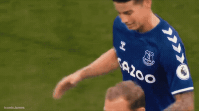 Soccer Player In Blue Sazoo Jersey Shaking Hands With Coach GIF