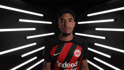 Soccer Player In Blue Shirt With OK On Sleeve GIF