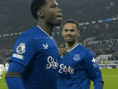 Soccer Player In Blue Shirt With Stake Running GIF