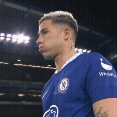 Soccer Player In Blue Shirt With Whalefin On Sleeves GIF