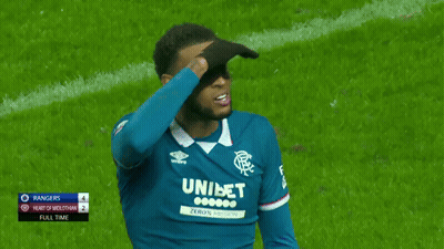 Soccer Player In Blue Unibet Jersey Covering Eyes GIF