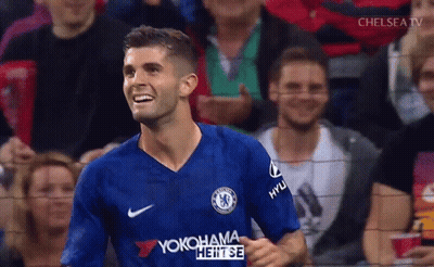 Soccer Player In Blue Yokohama Jersey Smiling GIF