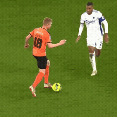 Soccer Player In Carlsberg Jersey Running To Ball GIF