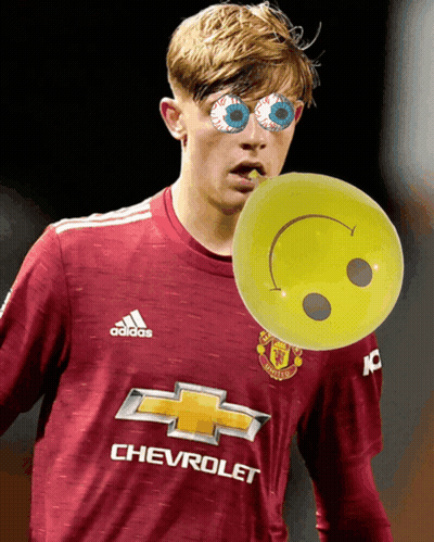 Soccer Player In Chevrolet Jersey Holding Smiley GIF