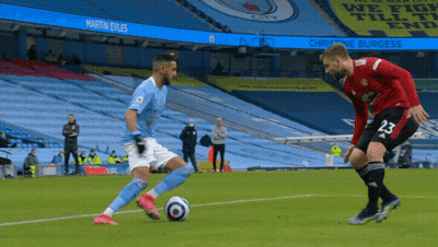 Soccer Player In City Jersey Kicking Ball GIF