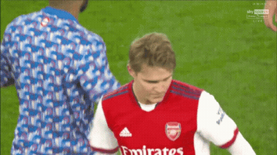Soccer Player In Emirates Fly Better Jersey Helped Off Field GIF