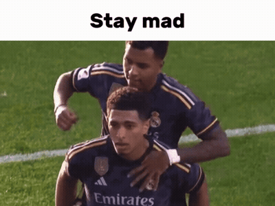Soccer Player In Emirates Jersey Hugged By Teammate GIF