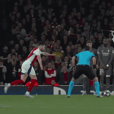 Soccer Player In Emirates Jersey Kicking Ball GIF