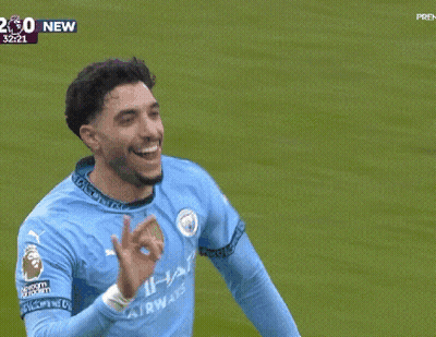 Soccer Player In Etihad Jersey Celebrating Goal GIF