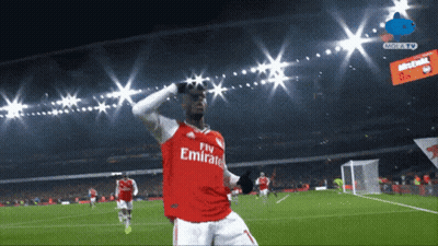 Soccer Player In Fly Emirates Jersey Celebrating Goal GIF
