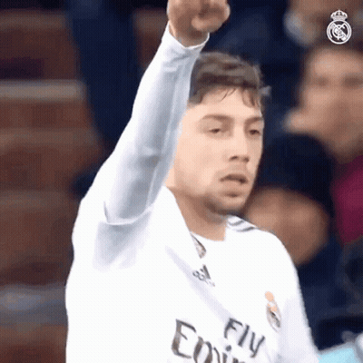 Soccer Player In Fly Emirates Jersey Fists Up GIF