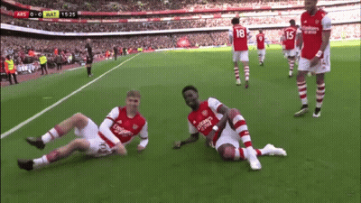 Soccer Player In Fly Emirates Jersey Lying GIF