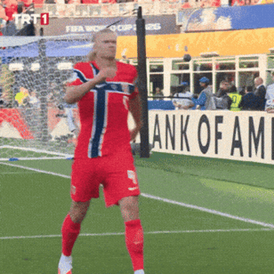 Soccer Player In Front Of Bank Of America Sign GIF