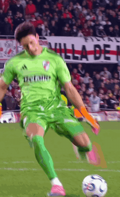 Soccer Player In Green Adidas Jersey Kicking Ball GIF