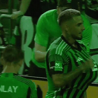 Soccer Player In Green And Black Striped Jersey Thumbs Up GIF