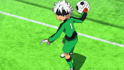 Soccer Player In Green And Black Uniform Holding Ball GIF
