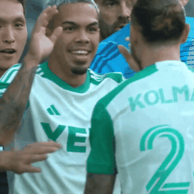 Soccer Player In Green And White Jersey Number 2 GIF