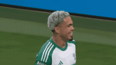 Soccer Player In Green And White Yeti Jersey GIF