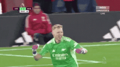 Soccer Player In Green Emirates Jersey Celebrates Goal GIF