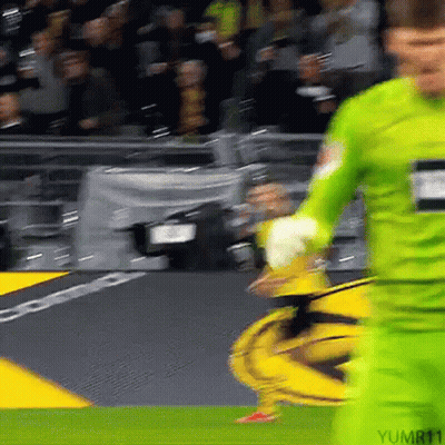 Soccer Player In Green Jersey Kicking Ball GIF